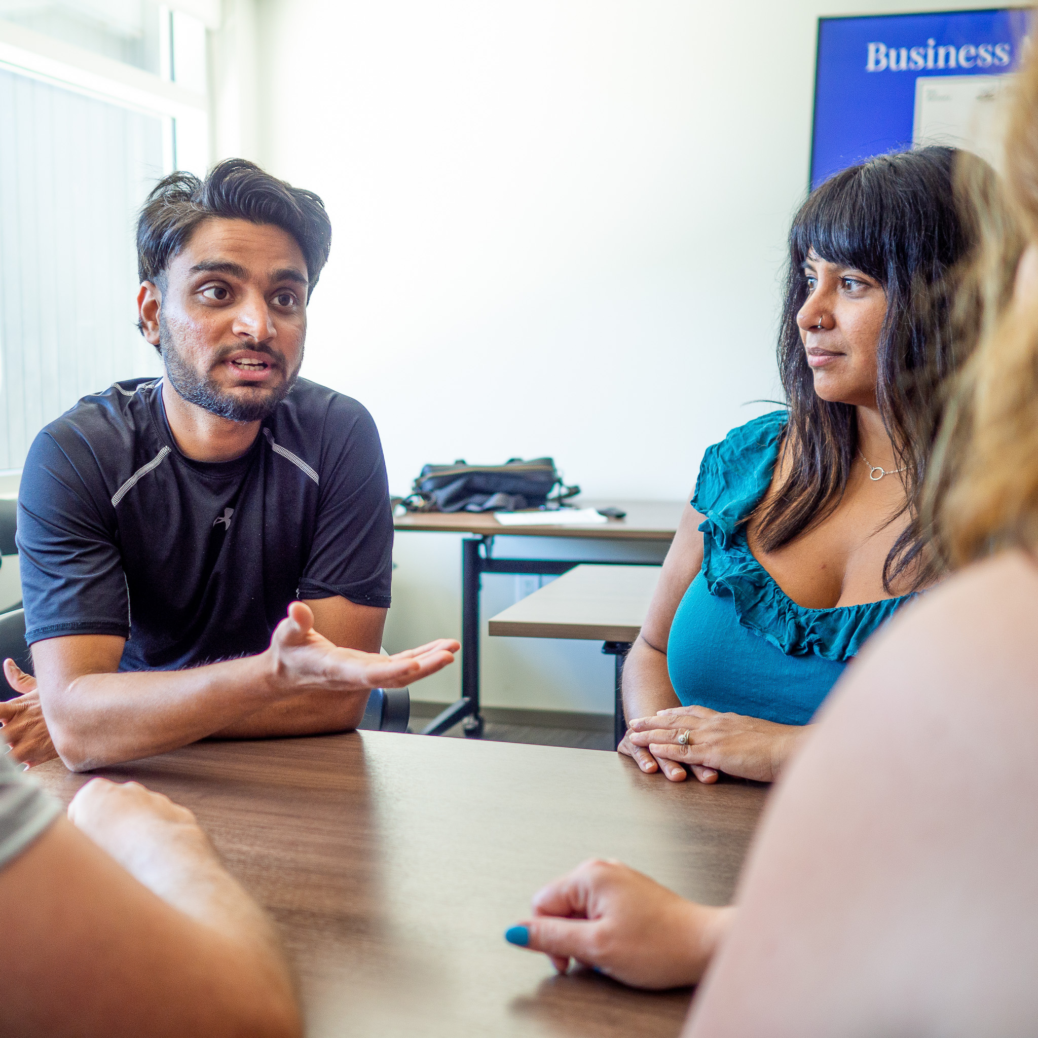 Shiven Khera, a Linkbase Technologies Inc. founder, explaining an idea to a group of people